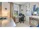 Functional home office space with modern desk, chair, and plenty of natural light at 19801 Fishhawk Trl, Venice, FL 34293
