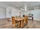Cozy dining room featuring a wooden table and chairs, creating a warm and inviting atmosphere for Gathering gatherings at 217 22Nd Street Ne Ct, Bradenton, FL 34208