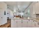 Bright kitchen with a stylish island, modern appliances, and an open layout at 217 22Nd Street Ne Ct, Bradenton, FL 34208
