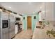 Clean, modern kitchen with stainless steel appliances and bright, cheerful design at 217 High Point Dr # 217A, Englewood, FL 34223