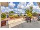 Backyard showcasing a patio with outdoor seating amidst lush landscaping, ideal for outdoor gatherings at 2402 33Rd W St, Bradenton, FL 34205