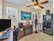 Comfortable office with modern tiled flooring, ceiling fan, and natural light from the large window at 2402 33Rd W St, Bradenton, FL 34205