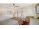 Inviting bedroom with modern furniture, ceiling fan, and closet at 2516 Goldenrod St, Sarasota, FL 34239