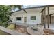Eye-catching front exterior displaying a modern design with outdoor seating, perfect for enjoying the surroundings at 2516 Goldenrod St, Sarasota, FL 34239