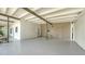 Spacious garage with ample storage, bright lighting, and a clean, finished interior to park your cars at 2516 Goldenrod St, Sarasota, FL 34239