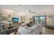 Inviting living room featuring stylish decor, natural light, and sliding doors to the outdoor space at 2516 Goldenrod St, Sarasota, FL 34239