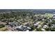 Wide aerial shot of a residential area, showing streets, homes, and green spaces at 2715 Herwald St, Sarasota, FL 34231
