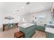 Open-concept kitchen featuring a large island with a breakfast bar, stylish countertops and ample cabinet space at 2715 Herwald St, Sarasota, FL 34231