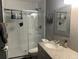 Modern bathroom with a glass-enclosed shower, granite vanity, and stylish fixtures at 2722 9Th Ave W, Bradenton, FL 34205