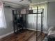 Modern bedroom featuring a trendy loft bed with a built-in desk and computer setup at 2722 9Th Ave W, Bradenton, FL 34205