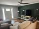 Cozy living room featuring wood floors, modern decor, and ample natural light at 2722 9Th Ave W, Bradenton, FL 34205