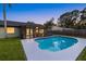 The backyard features a screened in patio with an in-ground pool perfect for entertaining friends and Gathering at 2915 Woodpine Cir, Sarasota, FL 34231