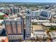 Elevated view of the modern building, capturing the urban skyline and surrounding cityscape with architectural details at 33 S Palm Ave # 1202, Sarasota, FL 34236