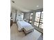 Bright bedroom with big windows, neutral tones, and minimalist design elements at 33 S Palm Ave # 1202, Sarasota, FL 34236