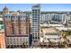 Exterior shot of the modern building, highlighting its urban setting and surrounding buildings with architectural details at 33 S Palm Ave # 1202, Sarasota, FL 34236