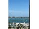 Scenic waterfront view showing boats in a marina and the city skyline in the background at 33 S Palm Ave # 1202, Sarasota, FL 34236