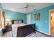 Bedroom with a comfortable bed, soft lighting, and relaxing ambiance for restful nights at 3910 77Th E Pl, Sarasota, FL 34243