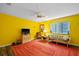 Bright living room with a TV, comfortable seating, and a cozy atmosphere at 3910 77Th E Pl, Sarasota, FL 34243
