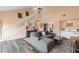 Inviting living room boasting high ceilings, wood flooring, and large windows for natural light at 3910 77Th E Pl, Sarasota, FL 34243