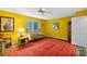 Cozy living room with natural light, comfortable seating, and stylish decor at 3910 77Th E Pl, Sarasota, FL 34243
