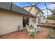 Enclosed patio with brick flooring and outdoor seating and view of exterior at 3910 77Th E Pl, Sarasota, FL 34243