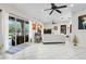 Well-lit living area with large windows and tile flooring at 4103 61St E Ave, Bradenton, FL 34203