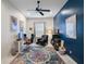 Home office with modern desk setup, leather chair, and an accent wall at 4103 61St E Ave, Bradenton, FL 34203