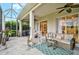 A beautiful screened patio with a cozy seating arrangement and picturesque outdoor views at 4103 61St E Ave, Bradenton, FL 34203