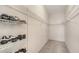 Walk-in closet equipped with shelving for organized storage space at 4274 Tennyson Way, Venice, FL 34293