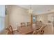 Dining room with wood flooring, dining set, and chandelier at 4274 Tennyson Way, Venice, FL 34293