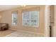 Bright laundry room with large windows and modern appliances in an open-concept home at 4274 Tennyson Way, Venice, FL 34293