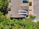 An aerial view showcases the well-maintained community with manicured landscaping and rooftops at 4500 Chinkapin Dr, Sarasota, FL 34232