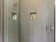 Stylish shower with built-in shelving at 4500 Chinkapin Dr, Sarasota, FL 34232
