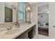 Elegant bathroom with dual sinks and granite counter tops at 4500 Chinkapin Dr, Sarasota, FL 34232