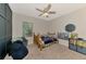 Cozy bedroom with carpet, window and ceiling fan at 4500 Chinkapin Dr, Sarasota, FL 34232