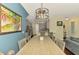 Spacious dining room leading into the kitchen and living area, perfect for Gathering gatherings at 4500 Chinkapin Dr, Sarasota, FL 34232