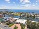 Home featuring waterfront views, boat docks, and nearby ocean, perfect for boating, fishing, and enjoying coastal living at 4829 Commonwealth Rd, Palmetto, FL 34221