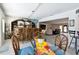 Spacious living area featuring a bar, dining area, and multiple seating options at 4829 Commonwealth Rd, Palmetto, FL 34221