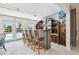 Entertainment bar with seating that provides access to the pool and waterfront at 4829 Commonwealth Rd, Palmetto, FL 34221