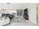 Open living area with a modern fireplace and stylish decor at 4829 Commonwealth Rd, Palmetto, FL 34221