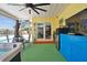 Enclosed patio with seating area, hot tub, and views of the water at 4829 Commonwealth Rd, Palmetto, FL 34221