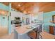 Bright, open kitchen with an island and stainless steel appliances at 507 Spring Ave, Anna Maria, FL 34216