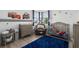 Fun bedroom with a Cars themed decor, grey furniture and cozy furniture at 5651 Trevesta Pl, Palmetto, FL 34221