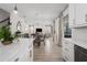 Open-concept layout seamlessly connects kitchen, dining area and the inviting living room at 5651 Trevesta Pl, Palmetto, FL 34221