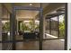 View of screen patio showcasing the outdoor seating area with view of the pool at 5651 Trevesta Pl, Palmetto, FL 34221