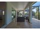 Screened patio with comfortable seating, perfect for outdoor entertaining with a pool view at 5651 Trevesta Pl, Palmetto, FL 34221