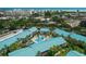Aerial view of community featuring a refreshing pool area surrounded by beautifully maintained grounds at 5681 Midnight Pass Rd # 104, Sarasota, FL 34242