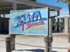 A sign that proclaims Siesta Beach, Florida is the #1 Beach in the USA at 5681 Midnight Pass Rd # 104, Sarasota, FL 34242