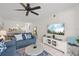 Comfortable living room with an open layout, modern decor, and an adjacent dining area at 5681 Midnight Pass Rd # 104, Sarasota, FL 34242