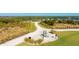 Community green space featuring an exercise park, winding trails and native landscaping at 6250 Grandview Hill Ct, Bradenton, FL 34203